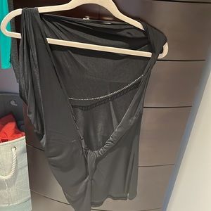 Very sexy black BCBG dress in a small can be worn off the shoulder with chain